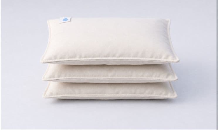 Oil absorbent pillows deployed in spill containment